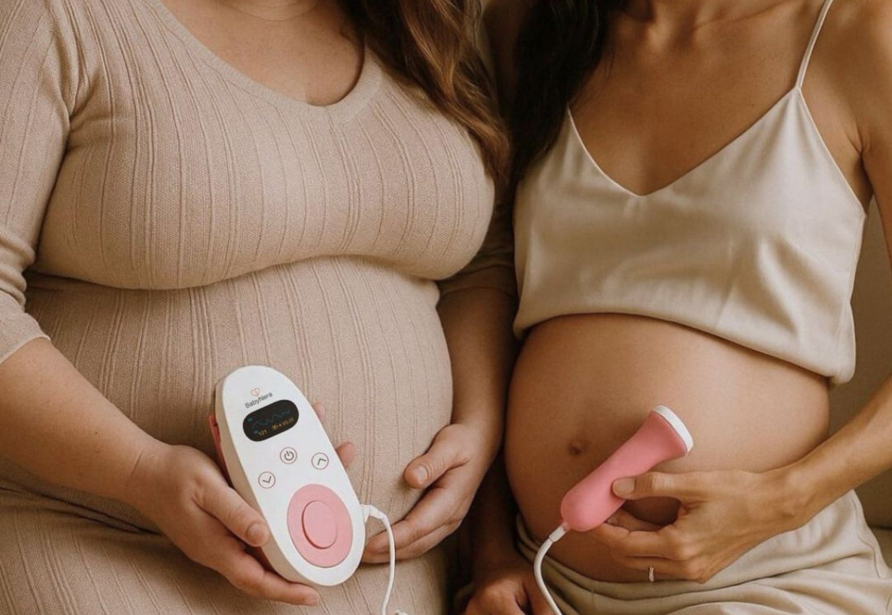 pregnant woman using fetal doppler at home to hear baby heartbeat