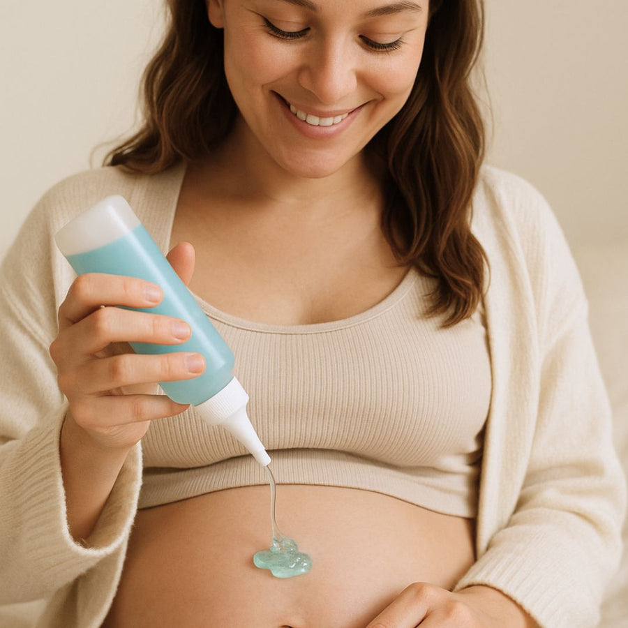 Pregnant woman applying ultrasound gel before using a BabyNera fetal doppler at home