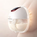 Load image into Gallery viewer, Side view of the BabyNera FlowEase wearable breast pump designed for hands-free pumping.
